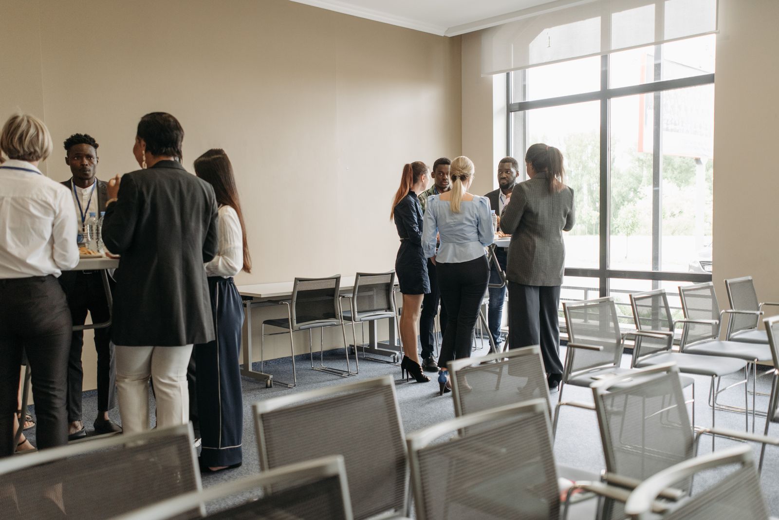 Group of business professionals networking at a TAP event