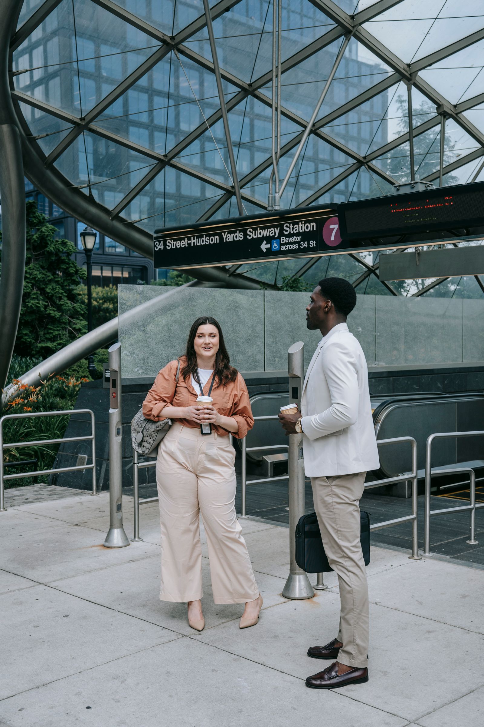Two business professionals talking outdoors